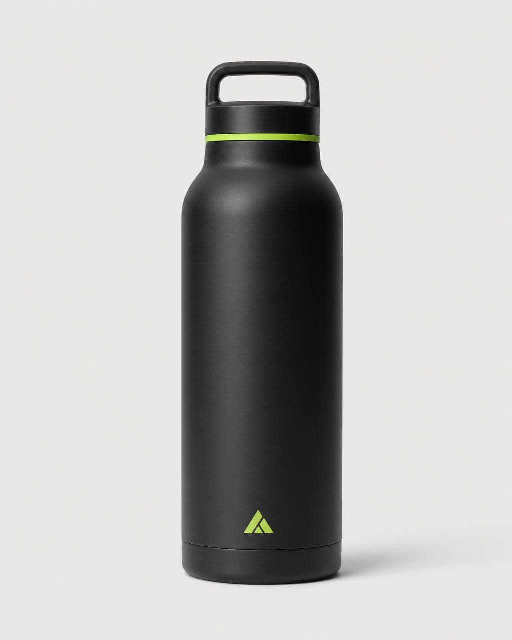 Matte black 32oz Blokhaus bottle with lime logo, shot on white